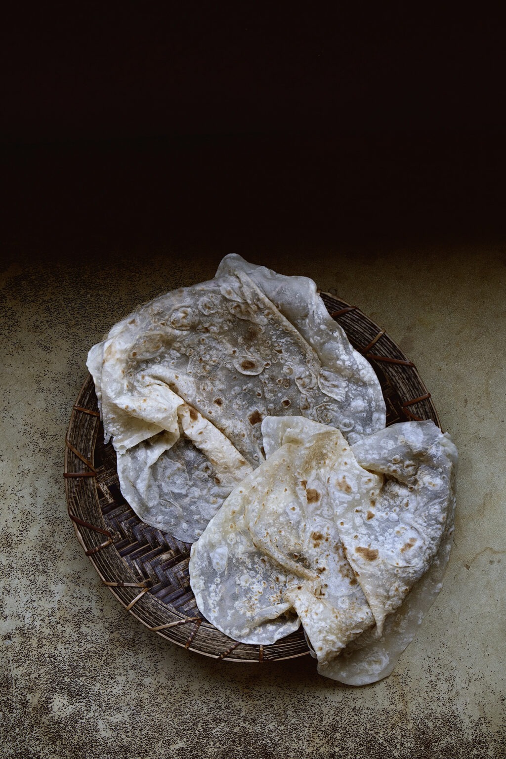 Paper thin soft chewy, Sonoranstyle flour tortilla Lady and Pups